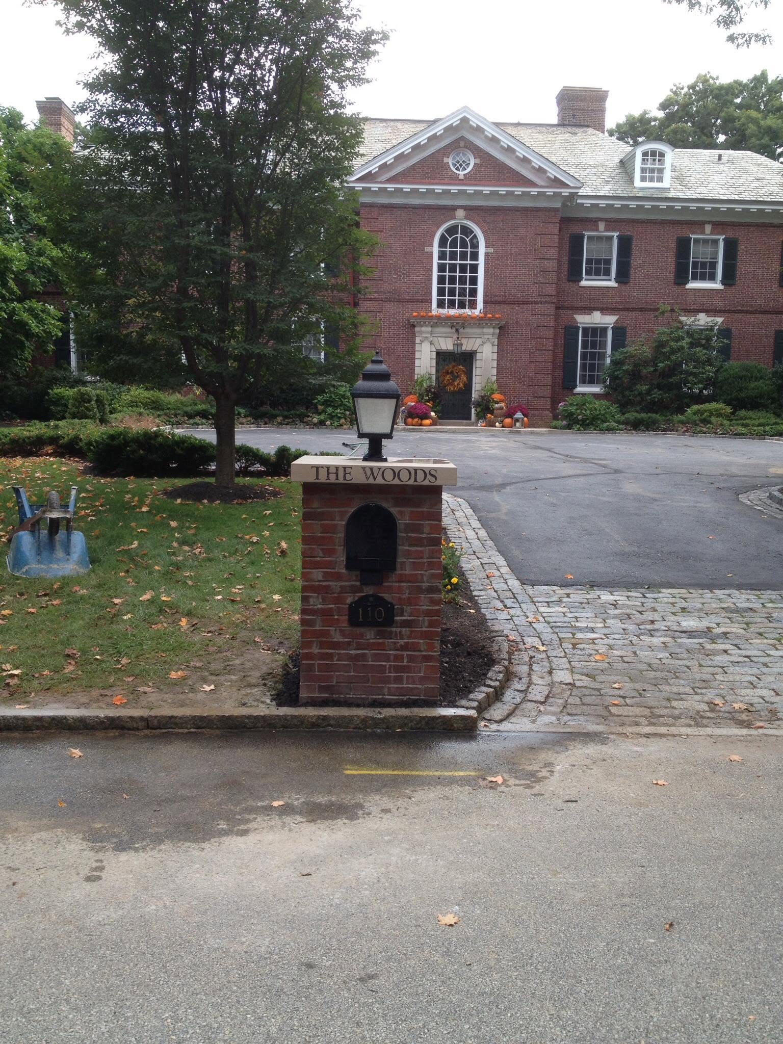 Brick pier with limestone cap