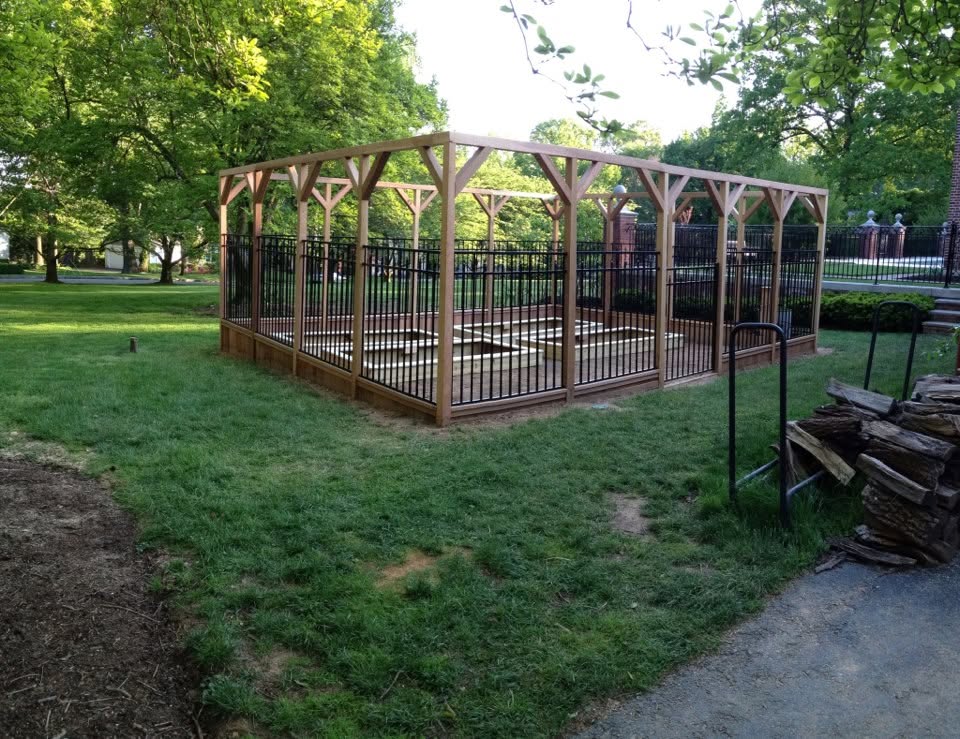 Fenced raised bed garden structure