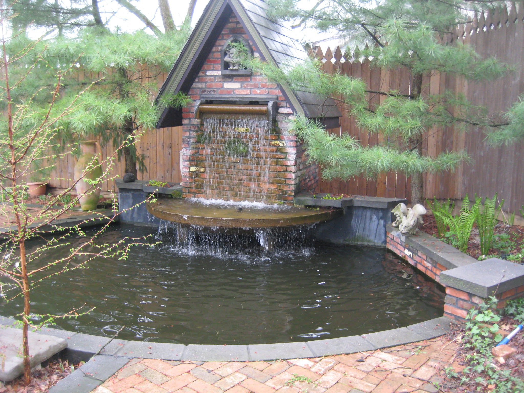Brick waterfall and koi pond